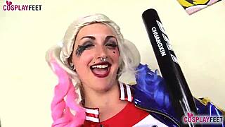 Harley Quinn in black pantyhose gives a footjob to an Italian man