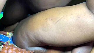 African MILF with big breast having sex with BBC in homemade video