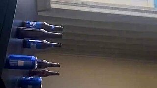 Slut eats cum on balcony in hot gloryhole action
