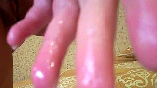 Beautiful red-haired teenage girl with wet and shiny pussy