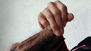 Young gay guy showing off his big cock in a solo video