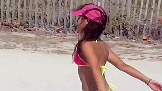 Unreal! Stunning young girl in micro bikini struts on beach with boyfriend’s kin!