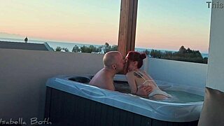 Hot tub blowjob gets steamy with redhead couple! Wet action awaits!