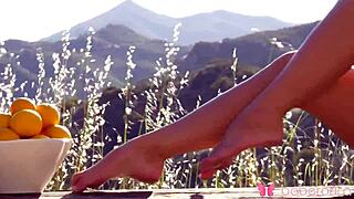 Solo session: Scarlet red pleasures herself outdoors