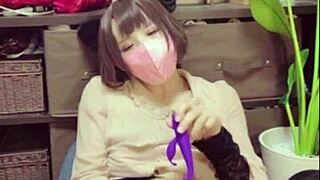 A beautiful crossdresser with Asian roots pleasures herself