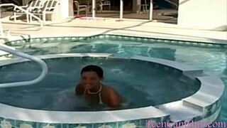 Young model Christina in a bikini teases by the pool