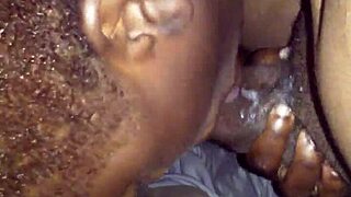 A curvy black escort gives deepthroat to big black cock