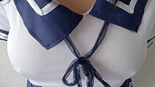 Young student with large breasts has her small waist fucked by a man in a missionary position.