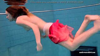 Russian beauty in red dress, big tits, underwater photoshoot