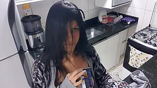 Beautiful woman cooks up some pleasure in the kitchen