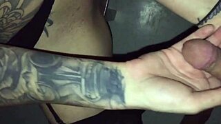 Young goth woman gives a blowjob to a man she met in a video booth