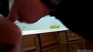 Married woman has kitchen sex with a man who has a large penis and she performs oral sex on him