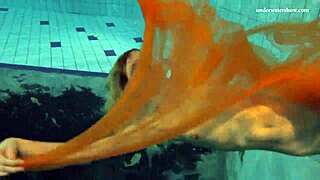 Nastya's outdoor striptease in the pool is very sexy