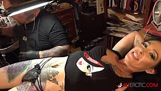 Marie Bossette gets a tattoo while she pleases herself