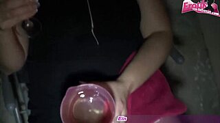 Amateur video of a German housewife being made to drink urine on the balcony