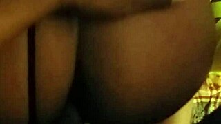 A couple has a quickie in a hotel room and the man strokes the woman from behind