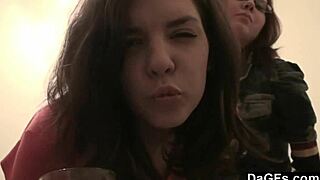 Two teen lesbians play with a camera in the bedroom