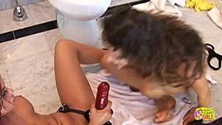 Lesbian Bitches Fisting and Fingering Buttholes in Toilet