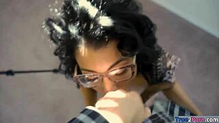 real estate agent poses in glasses