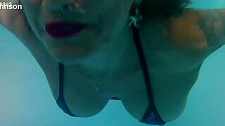 Melissa the Mermaid Shows Off Tattoos and Poolside Charm with Brown Eyes