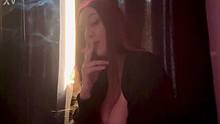 Italian milf Artemisia Love smokes solo with long hair.