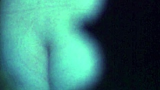 I watch this tattooed babe rip her clothes off while stripping in the shower, her body glistening under the water as she teases me with every move