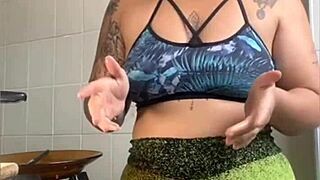 Is this married woman really cooking videos, or just flashing her swollen pussy online?