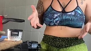 Is this married woman really cooking videos, or just flashing her swollen pussy online?