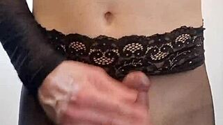 the transsexual with a monster cock strokes until he cums all over her nylon pantyhose and ass