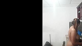 Feeling excited as this cute young woman cooks naked in the kitchen, her tall body exposed with toys.