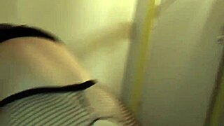 Using big stick on dildo and interacting with person simultaneously