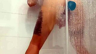 hot teen gets horny in the shower, using her toy for masturbation