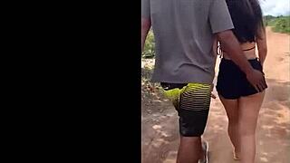 curvy brazilian wife bends over on dirt road