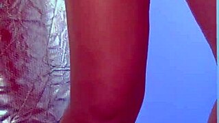 college desi in sexy dress and sneakers using glass dildo