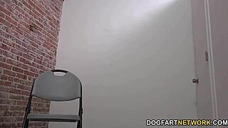 Lisa Tiffian Sucks and Fucks White Cock Through Glory Hole in Hardcore Interracial Scene