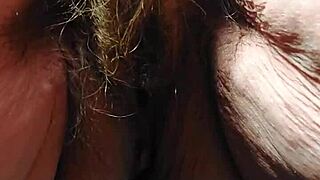 German granny uses cucumber in her hairy slit for fun.