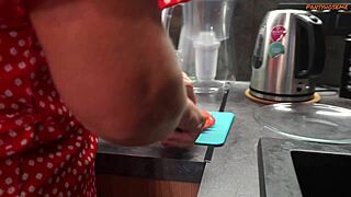 hubby films wife in kitchen