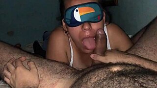 blindfolded slut devours cock with sloppy deepthroat skills.