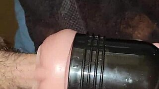 Stroking monster cock in fleshlight until cumshot.