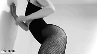 petite girl teases with fishnet tights and ass worship