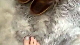 Nice Friday with barefoot feet in leather skirt