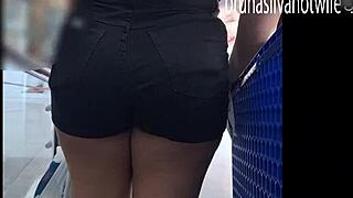 Filming hot blonde in market voyeur.