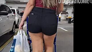 Filming hot blonde in market voyeur.