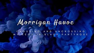 milf crosses legs in black pantyhose teasingly