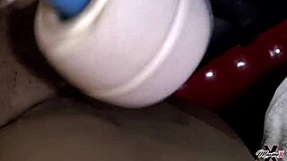 Maxine moans while fucking her ass with toys in stockings