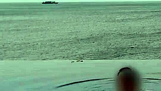 skinny student with cute legs relaxes by the infinity pool