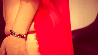 Latina in red lingerie unleashes her sensual side with huge tits.