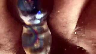 up close with that hairy pussy getting glass dildo action during solo masturbation