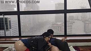 Kitty fucks in window for voyeurs