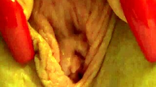 Tanned petite girl with conical tits enjoys close-up views of her body.